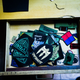 Krasnopolsky collects uniform patches of all sorts, both new and recycled from the military uniforms of various countries, all to be sent to the troops.